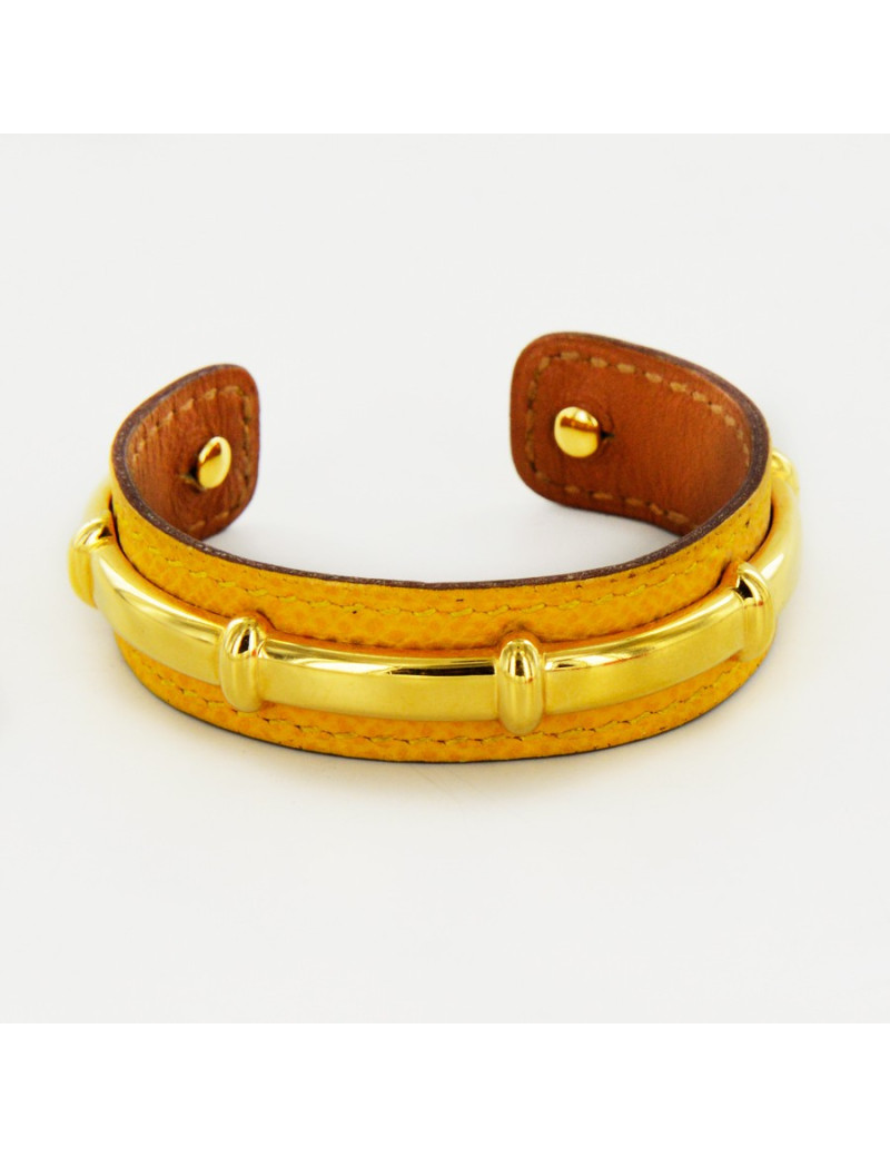Bracelet HERMES cuir jaune et doré