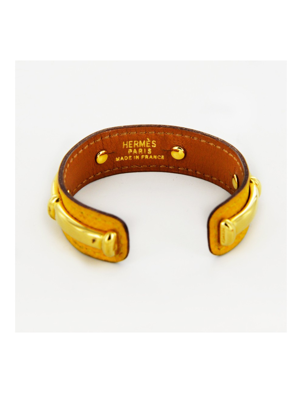 Bracelet HERMES cuir jaune et doré