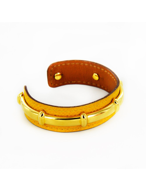 Bracelet HERMES cuir jaune et doré