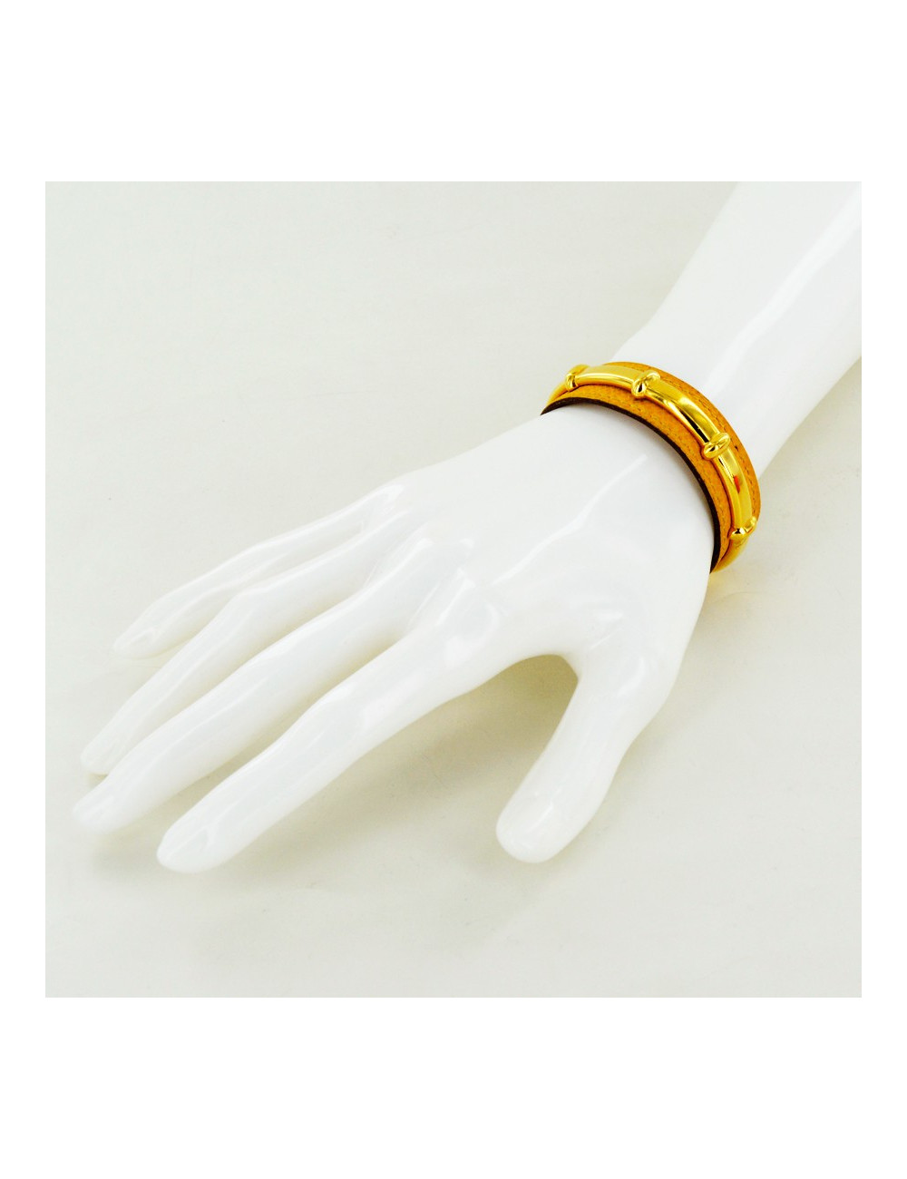 Bracelet HERMES cuir jaune et doré