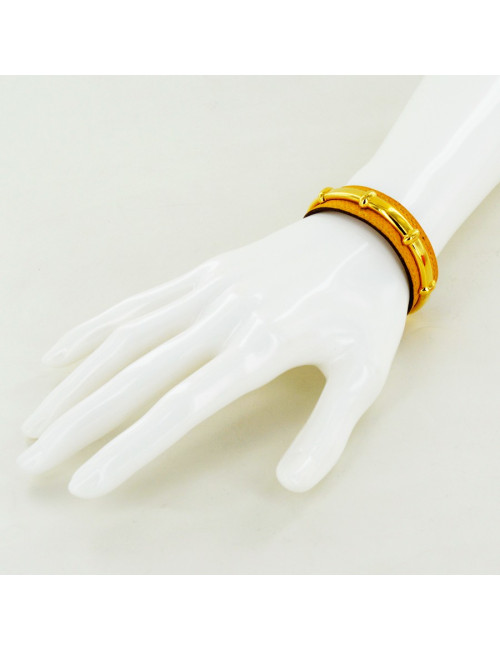 Bracelet HERMES cuir jaune et doré