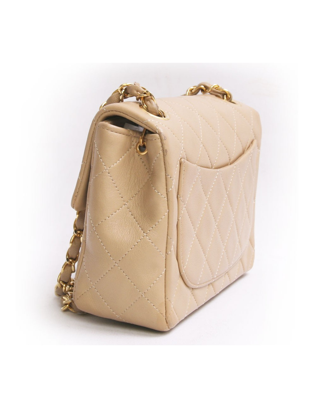mini sac CHANEL matelassé en cuir d'agneau beige