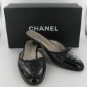 CHANEL black leather mules