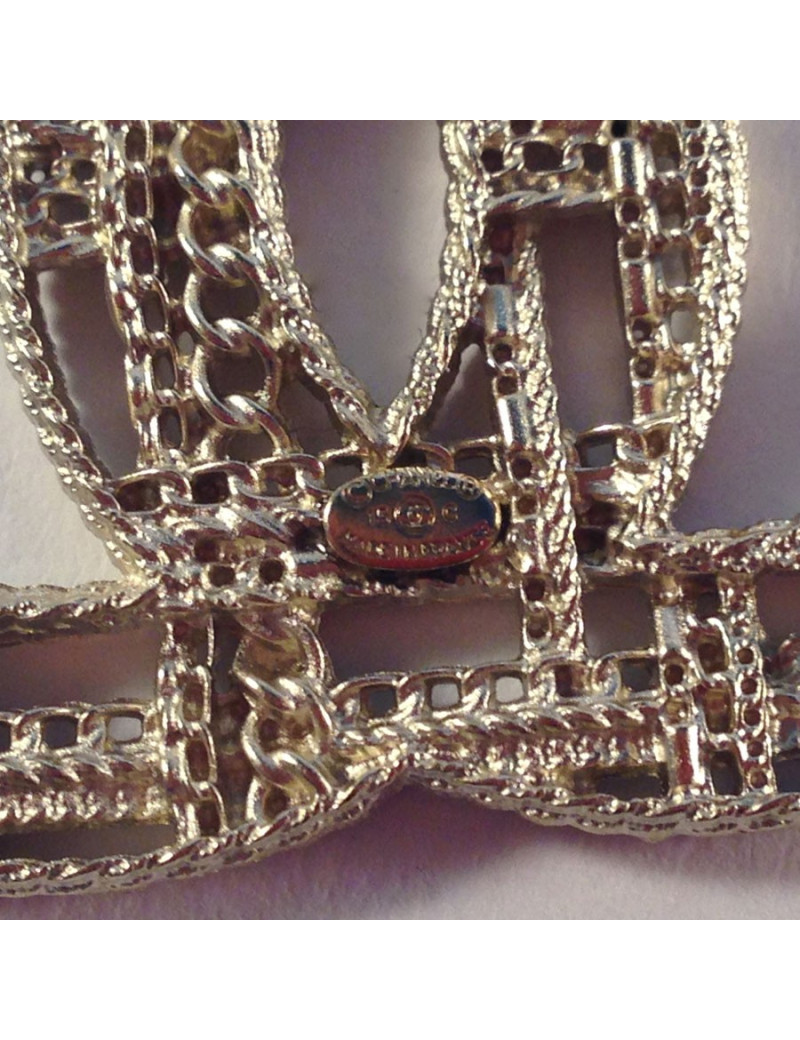 Broche CC Chanel en métal or pâle