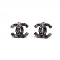 CHANEL GM resin black and shiny ear clips