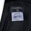 Jupe CHANEL T 42 plissée tweed noir
