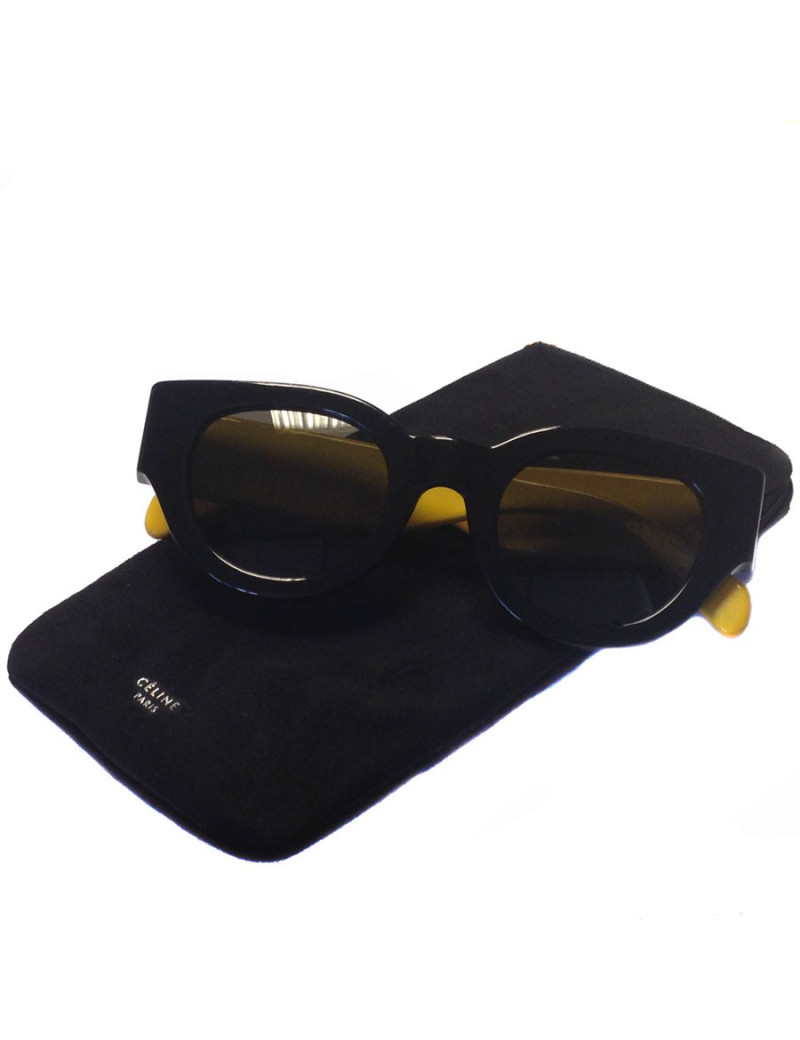 Lunettes de soleil CELINE noires et jaunes