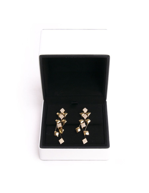 clous d'oreille CHANEL pendantes or jaune et diamants