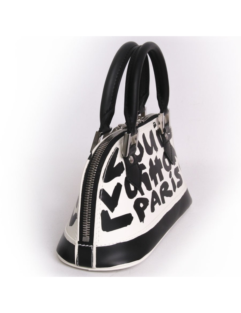 Sac "Alma Graffiti" LOUIS VUITTON PM cuir glacé monogram graffiti Edition limitée