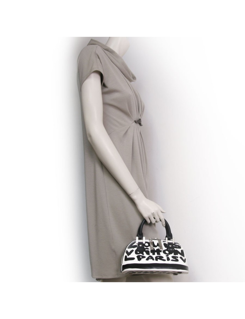 Sac "Alma Graffiti" LOUIS VUITTON PM cuir glacé monogram graffiti Edition limitée