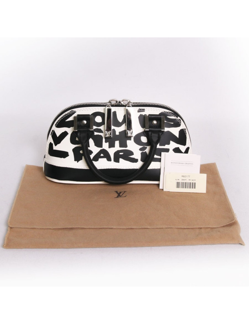 Sac "Alma Graffiti" LOUIS VUITTON PM cuir glacé monogram graffiti Edition limitée