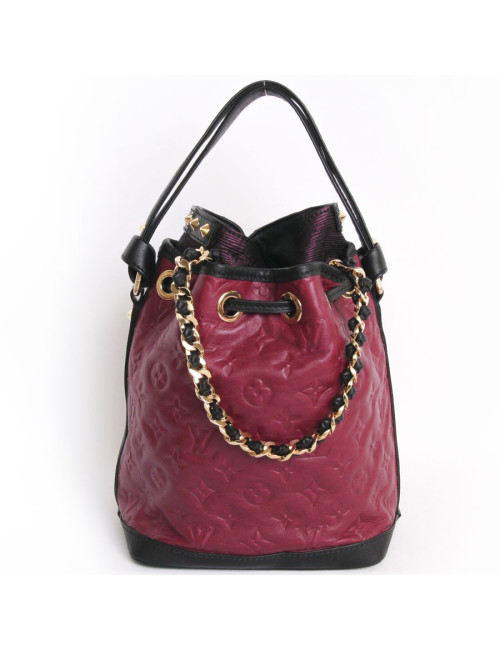 Sac "Néo Noé" LOUIS VUITTON cuir embossé monogram framboise