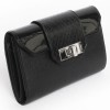 CARTIER wallet in black grained leather and snake