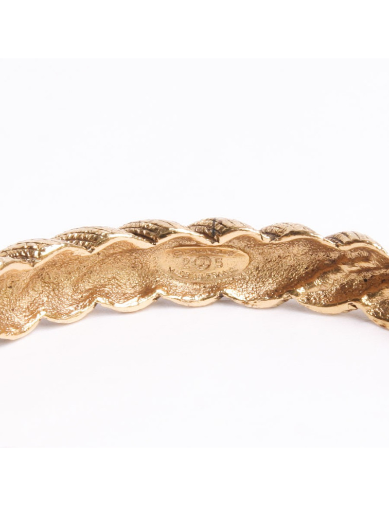 Bracelet couture  CHANEL en métal torsadé doré vieilli 