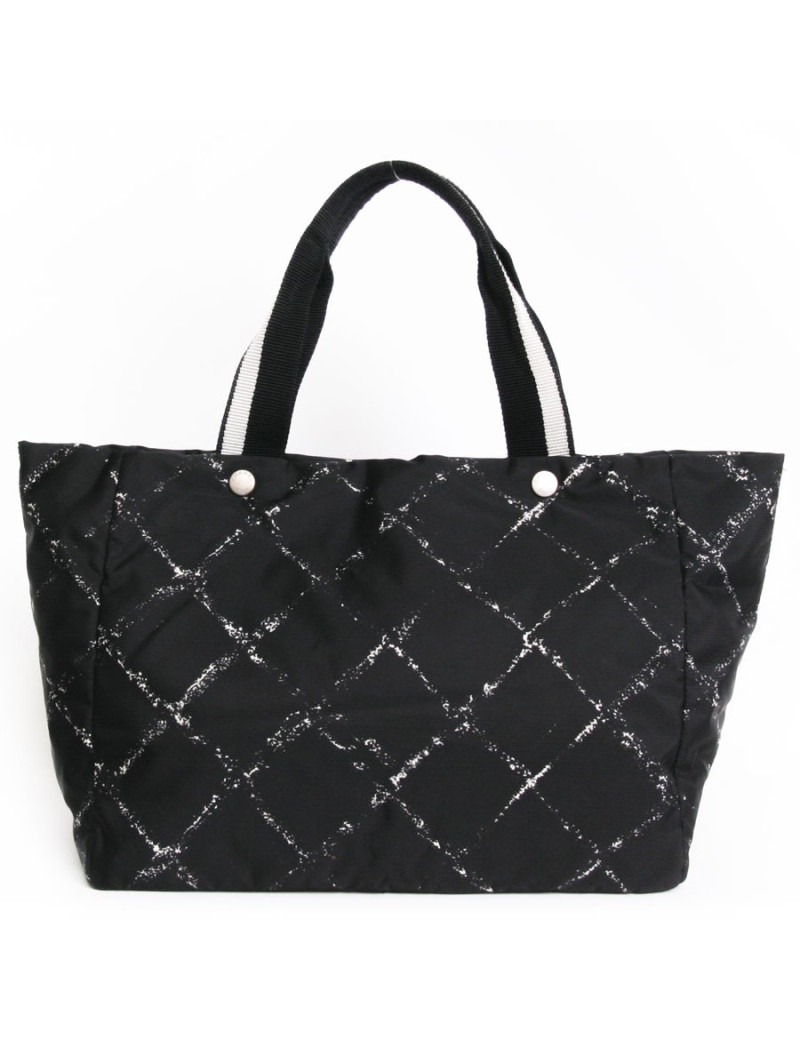 Sac cabas CHANEL noir et blanc "ligne voyage"
