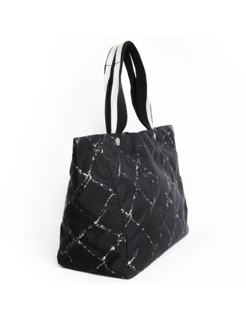 Sac cabas CHANEL noir et blanc "ligne voyage"