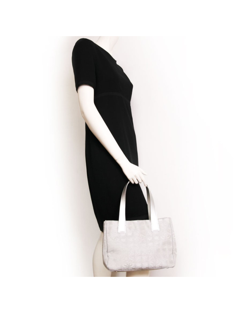 Sac CHANEL en toile argent "ligne voyage"