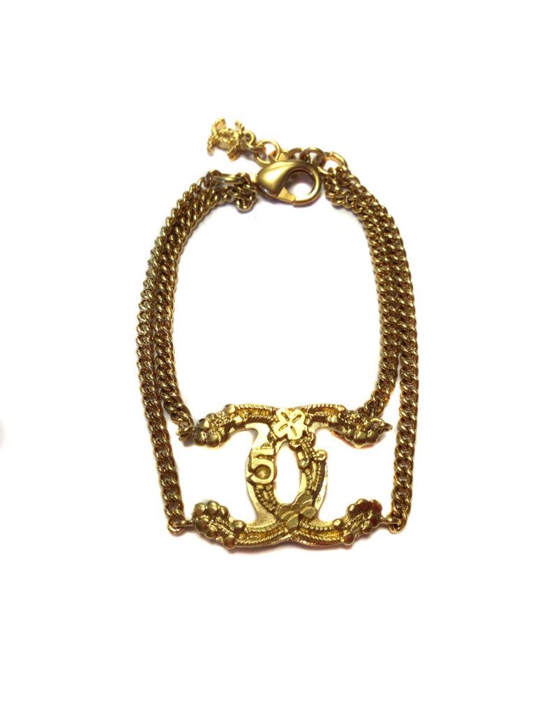 Bracelet CHANEL CC doré avec sigle "5"