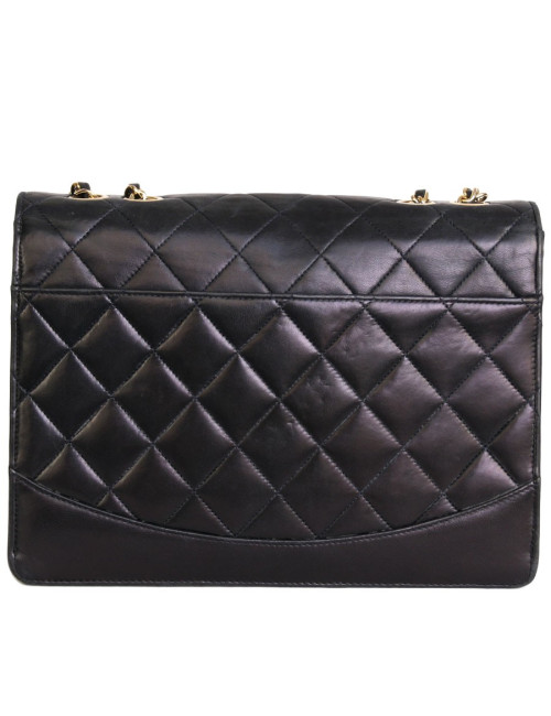 Sac  CHANEL en cuir  d'agneau matelassé bleu marine