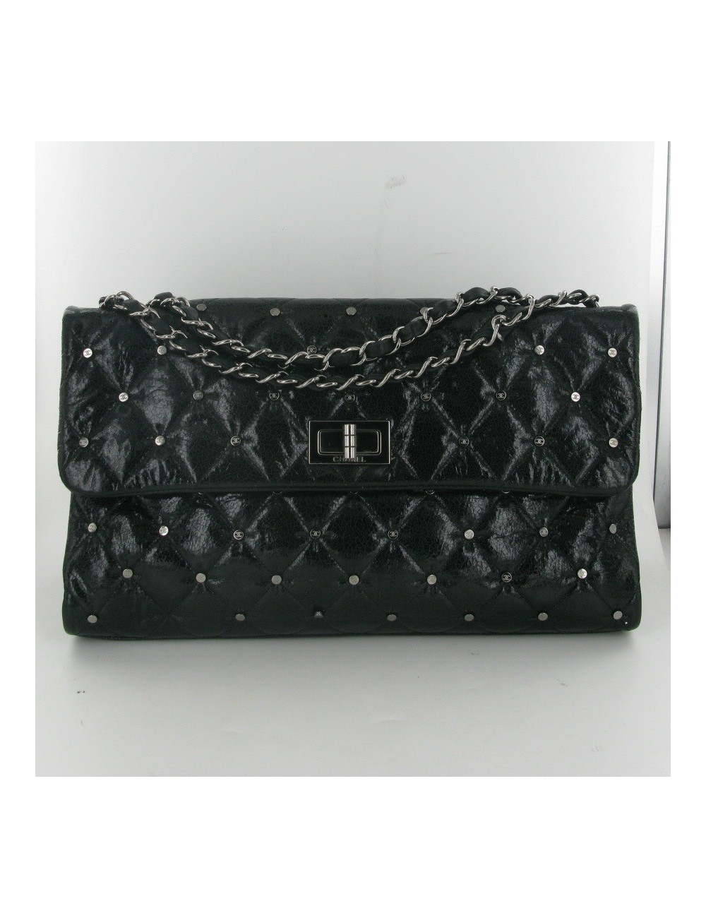 Aged patent leather CHANEL bag