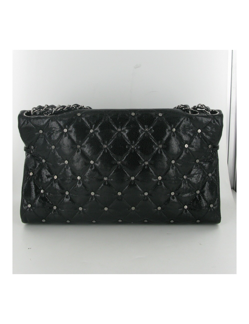 Aged patent leather CHANEL bag