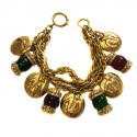 CHANEL 80' Vintage bracelet in gilded metal and molten glass
