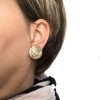 CHANEL round clip-on earrings in gilded metal 