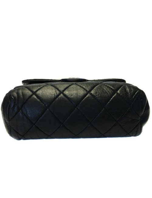 CHANEL quilted black leather pouch