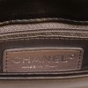 CHANEL bag in black soft leather with a CC made of chains