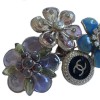 Couture CHANEL brooch in molten glass, rhinestones and black enamel