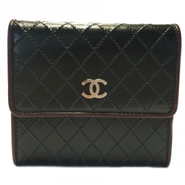CHANEL wallet in woven black leather and bordeaux contour