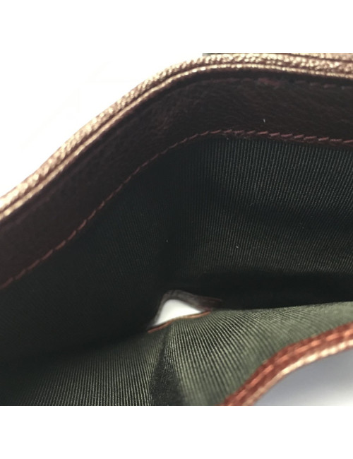 Portefeuille CHANEL en cuir noir tressé et contour bordeaux