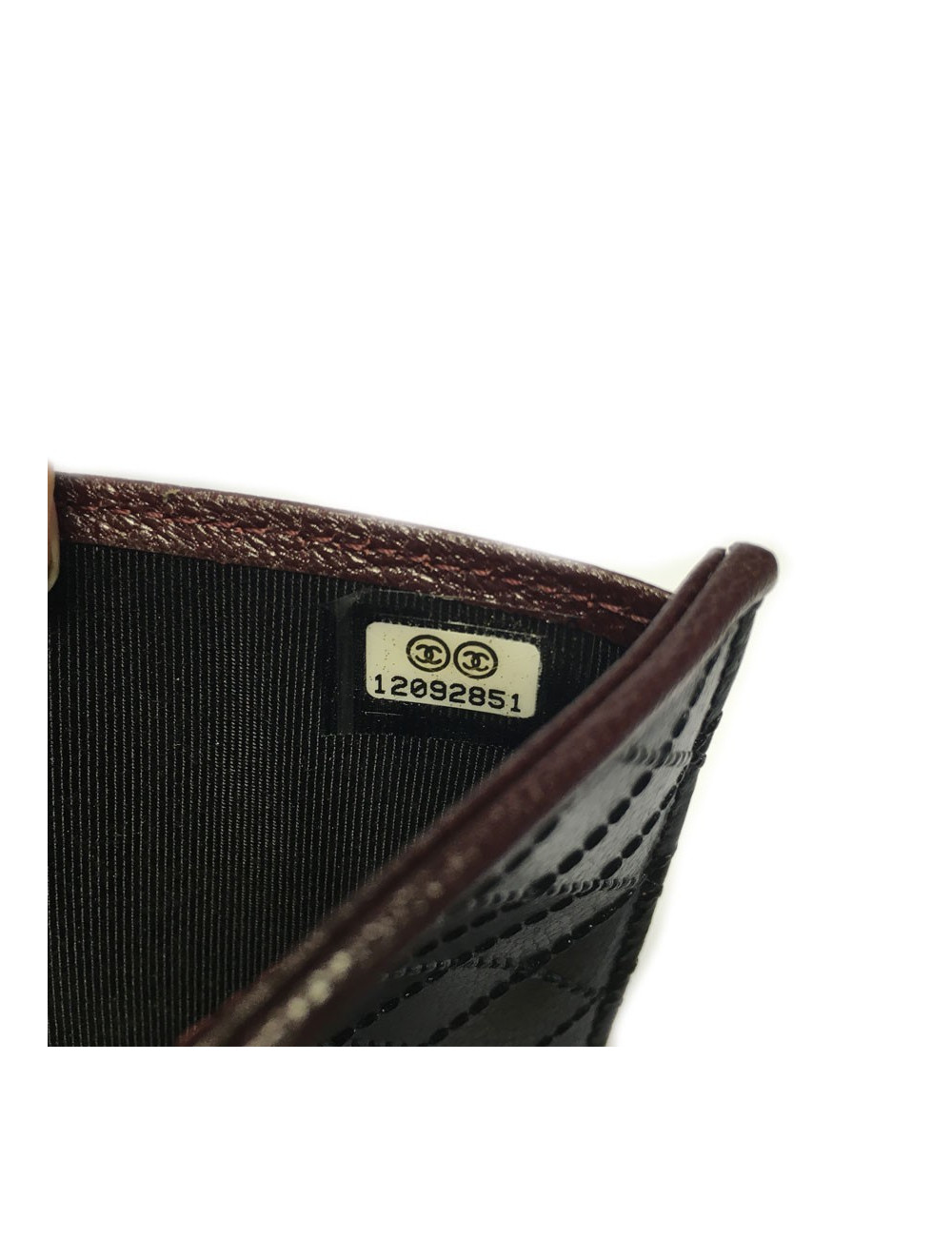 CHANEL wallet in woven black leather and bordeaux contour