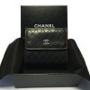 CHANEL wallet in woven black leather and bordeaux contour