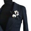 CHANEL brooch in white tweed and black fabric