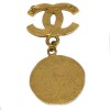 CHANEL CC brooch with a medallion in gilded metal