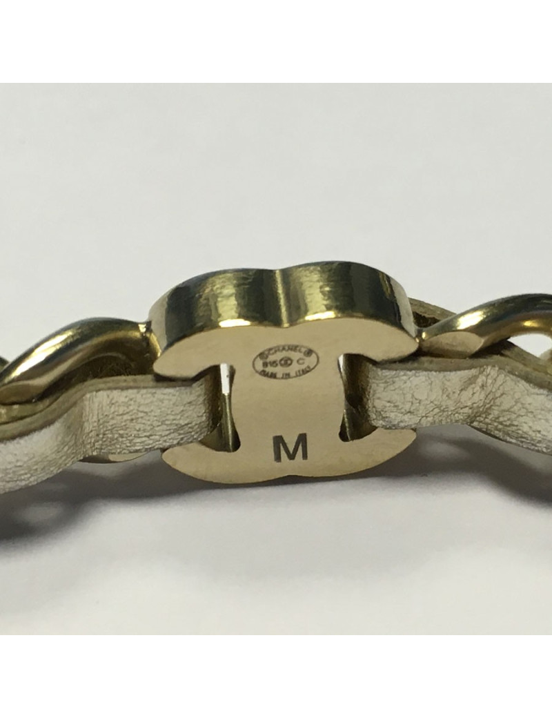 Bracelet CHANEL en métal doré entrelacé de cuir