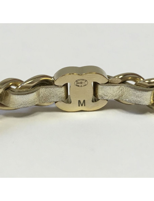 Bracelet CHANEL en métal doré entrelacé de cuir