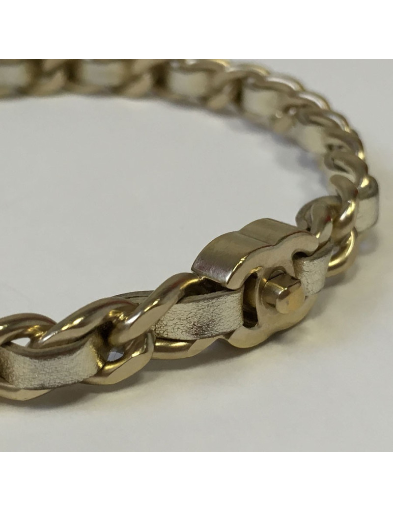 Bracelet CHANEL en métal doré entrelacé de cuir