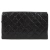 CHANEL quilted shiny black leather pouch