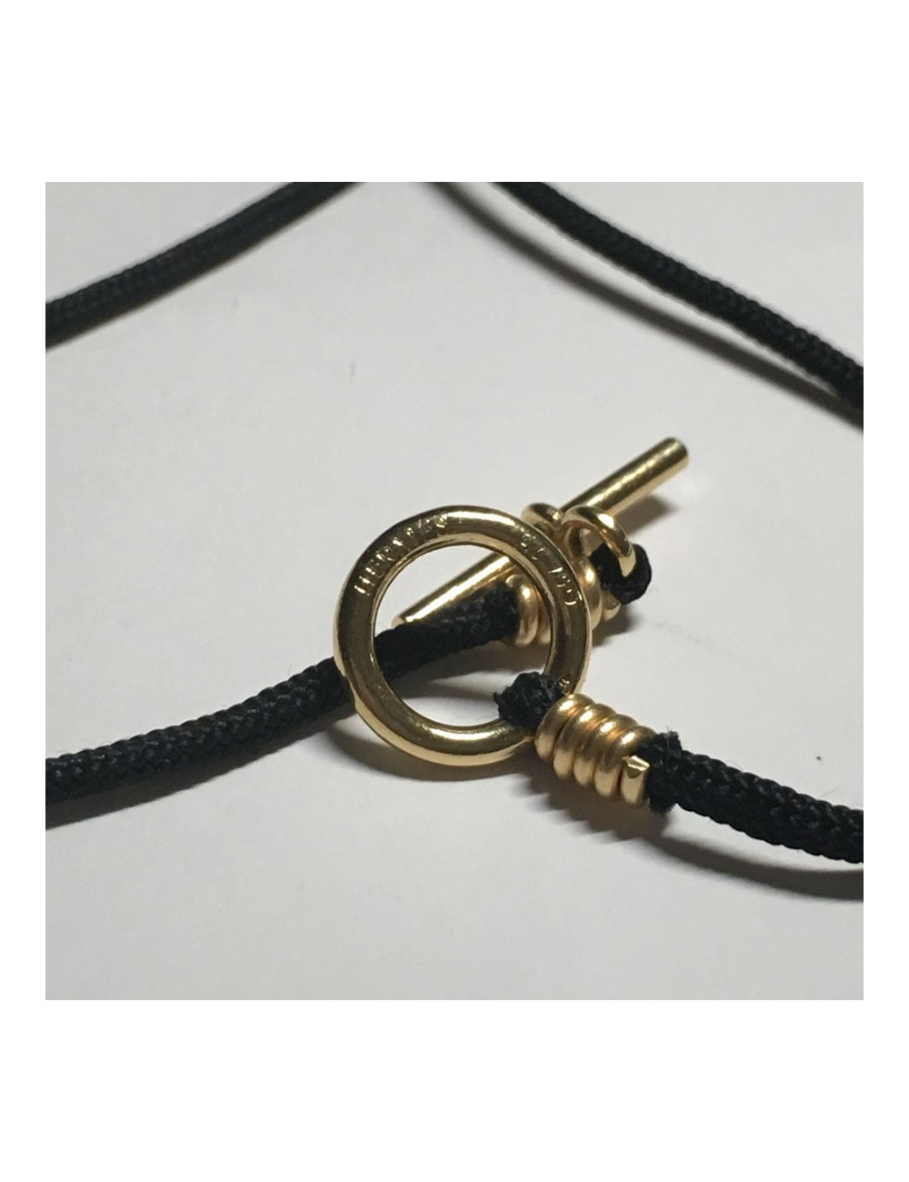 Collier HERMES lien noir et bijouterie or