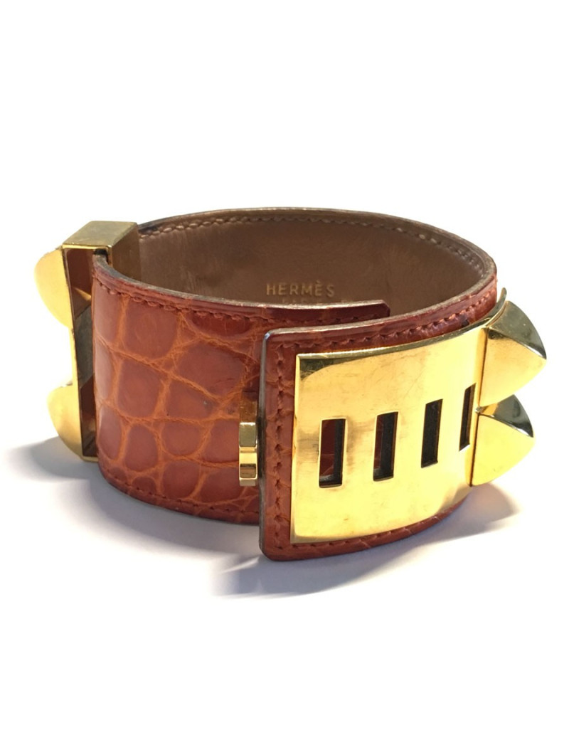 HERMES Medor cuff in orange leather and gold hardware