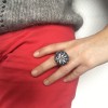 Bague CHANEL haute couture T argentée, strass et pierre transparente en résine pailletée