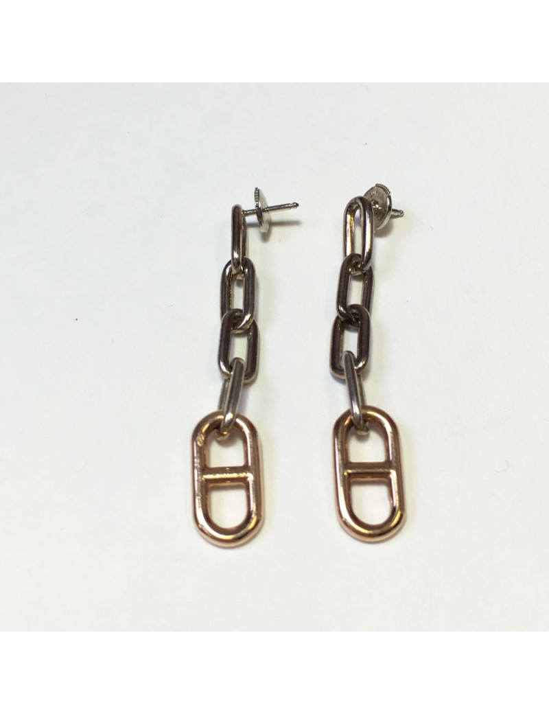Boucles d'oreille clous HERMES pendants en or et argent
