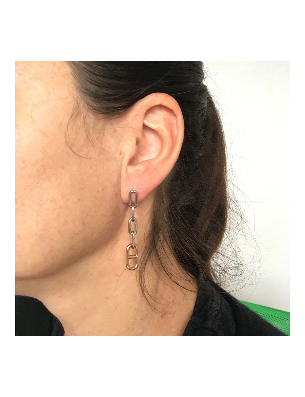 Boucles d'oreille clous HERMES pendants en or et argent