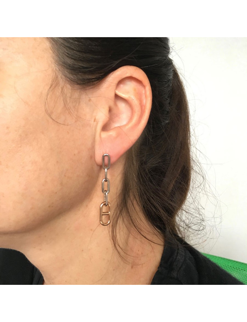 Boucles d'oreille clous HERMES pendants en or et argent