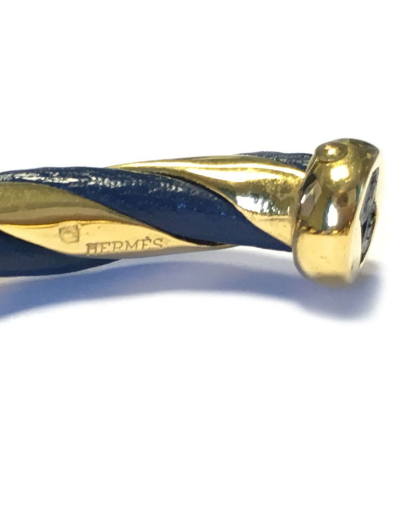 Bracelet twist HERMES blue leather and gilded metal