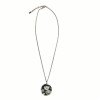 CHANEL necklace in plexi with inclusion of lace and beads