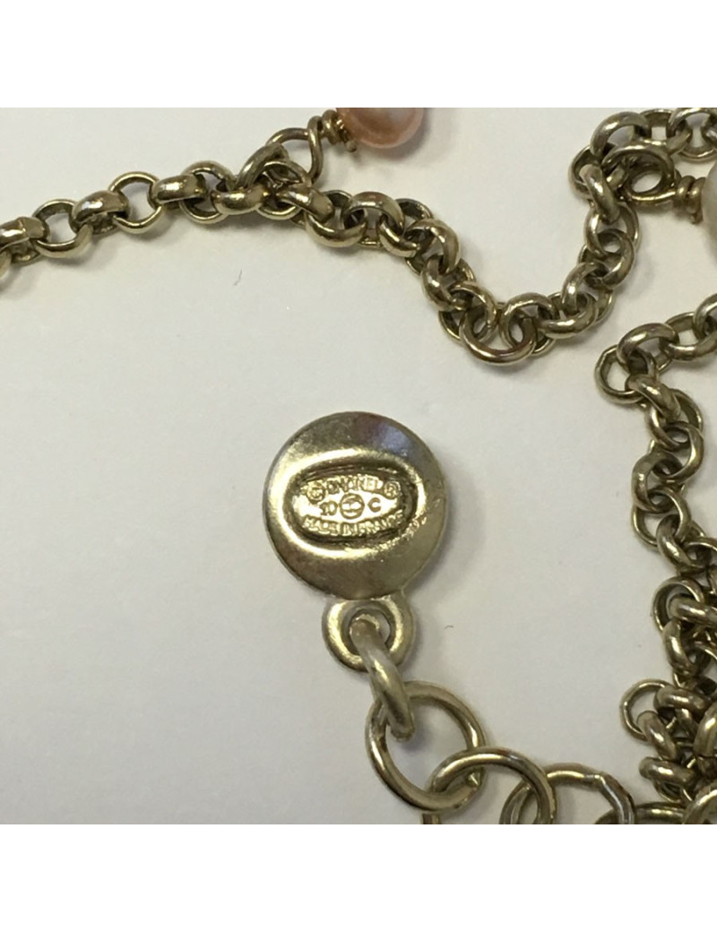  Collier CHANEL en métal doré et pendentif fleur