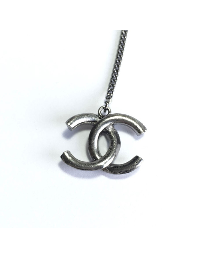 xxx Boucles d'oreille clous pendants CHANEL en métal argenté